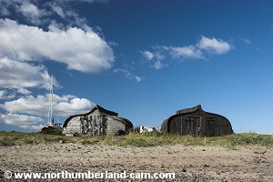 Upturned boathouses.